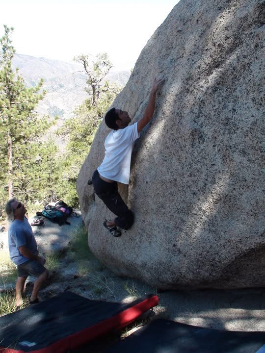 Bailey climbing Obsession Boulder
